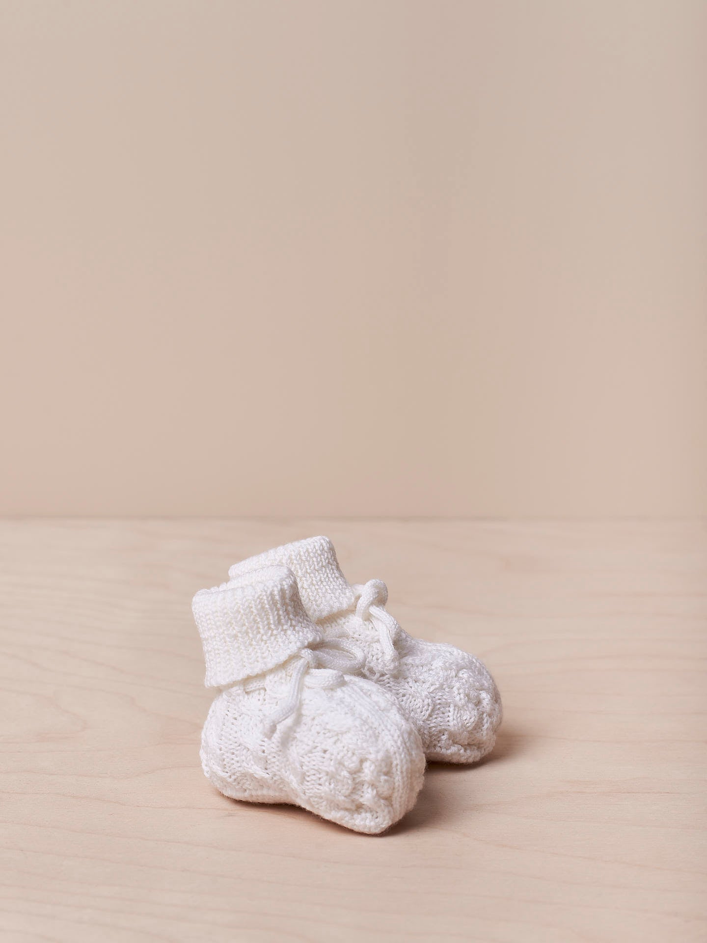 Carapins tricotados em lã - Pérola